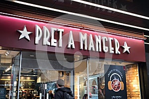 Exterior shot of Pret A Manger take away sandwich and coffee  shop with customer entering