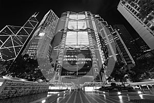 Exterior of skyscraper in central district of Hong Kong city at night