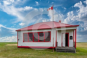 The exterior of St. Johns Schoolhouse on the prairies near Leader, Saskatchewan