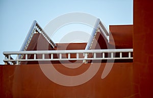 Exterior staircase details, white railings, architectural detail