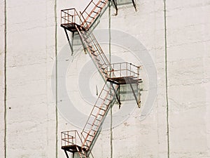 Exterior stairs on white wall