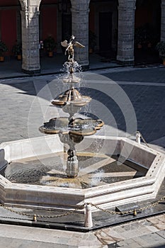 Exterior sunny view of a fountain in the historical National Palace