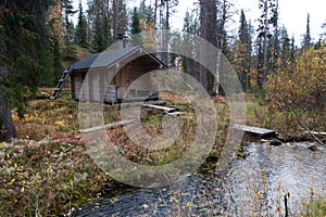 Exterior of Traditional Finnish Sauna in Taiga Forest