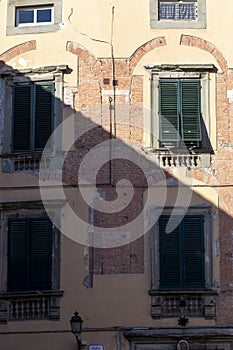 Exterior of typical Italian buildings. Lucca, Tuscany, Italy