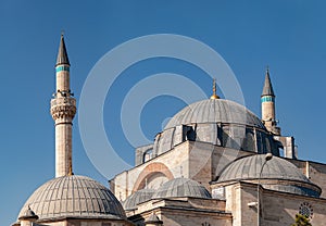 Exterior view of  beautiful historical Selimiye Mosque in front of clear blue sky in Konya photo