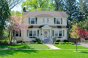 Exterior view of charming colonial two story home in suburban ne