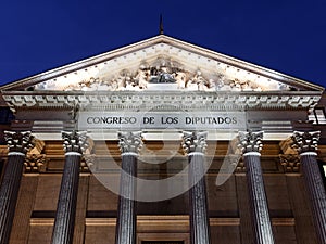Exterior view of Congreso de los deputados congress of deputies Madrid Spain at night photo