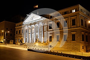 Exterior view of Congreso de los deputados congress of deputies Madrid Spain at night photo