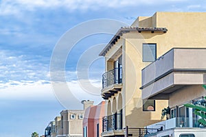 Exterior view of elegant houses in Huntington beach with blue sky background