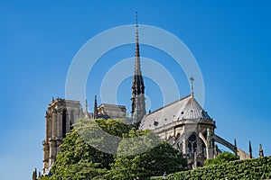 Exterior view of the famous Notre-Dame Cathedral via the rivier photo