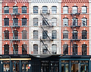 Exterior view of historic brick buildings along Duane Street in the Tribeca neighborhood of New York City