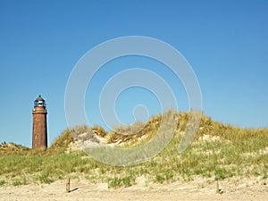 Exterior view of the historic Darsser Ort lighthouse in the dunes of the Western Pomerania Lagoon Area National Park, Germany