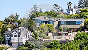 Exterior view of houses located in a residential neighborhood; Redwood City; San Francisco bay area, California