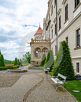 Exterior view of Konopiste Castle, former residence of Archduke Franz Ferdinand of Austria, surrounded by lush greenery and photo