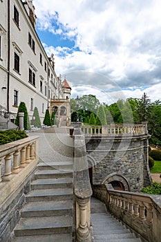 Exterior view of Konopiste Castle, former residence of Archduke Franz Ferdinand of Austria, surrounded by lush greenery and photo