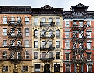 Exterior view of old brick apartment buildings in the East Village neighborhood of New York City