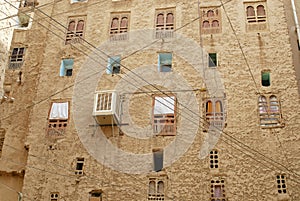 Exterior wall of the mud brick tower house in Shibam, Hadramaut valley, Yemen.