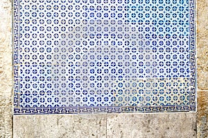 Exterior wall of a residential building with traditional portuguese tiles in the Bairro Alto district in the old town of Lisbon, photo