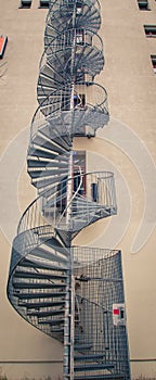 Exterior wire spiral staircase on a building