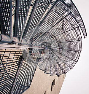 Exterior wire spiral staircase on a building