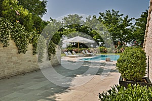 Exteriors shots of a modern swimming pool photo