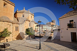 The external facade of Carmen church (on the left) in Alhama de Granada photo