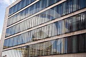 External facade of the Foreign Office of the Federal Republic of Germany with reflection of the City Palace building site.