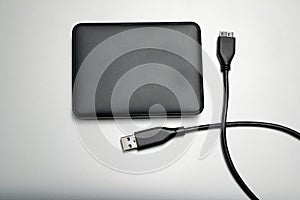 External hard drive on gray background