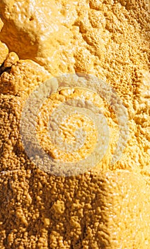 External insulation of house walls with yellow sprayed polyurethane foam