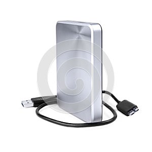 External silver hard disk drive 2.5 inches with a usb cable isolated on white