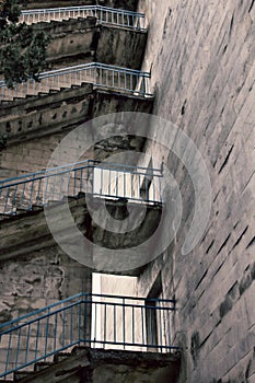 External stairs, landings and stairwells of high-rise buildings