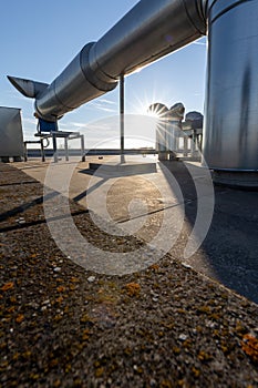 External unit of commercial air conditioning and ventilation system installed on industrial building roof