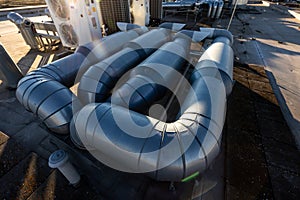 External unit of commercial air conditioning and ventilation system installed on industrial building roof