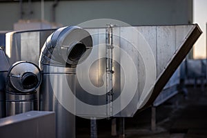 External unit of commercial air conditioning and ventilation system installed on industrial building roof