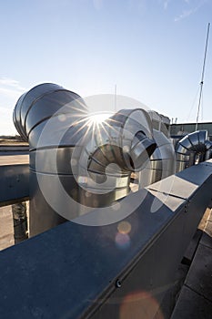 External unit of commercial air conditioning and ventilation system installed on industrial building roof