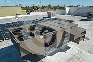 External unit of commercial air conditioning and ventilation system installed on industrial building roof. Exhaust vent