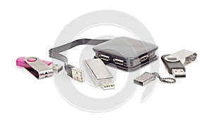 External USB hub and usb flash drives on white background