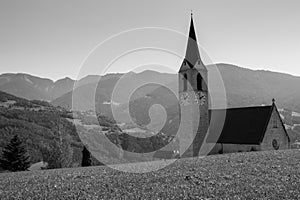 External view of the architecture of the church of Velturno in Val Isarco, Italy photo