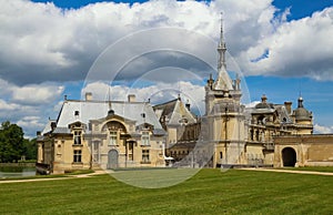 External view of famous Chantilly Castle, 1560 - a historic castle located in town of Chantilly, Oise, Picardie .