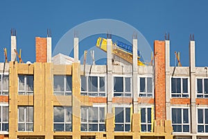 External wall insulation. Solid wall insulation. Energy efficiency house wall renovation for energy saving. Exterior house wall he