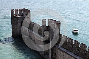 Wall of Sirmione Castle in Garda lake, Italy