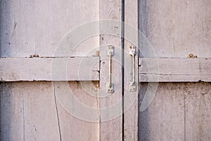 The external wood window and wall of a vintage wood house