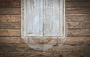 The external wood window and wall of a vintage wood house