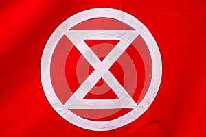 Extinction Rebellion sign in white on red