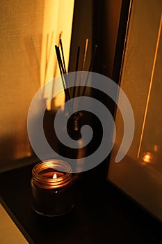 Extinguished candle. smoke from a candle aroma for home on a dark background. the concept of a cozy home relaxing atmosphere. rela