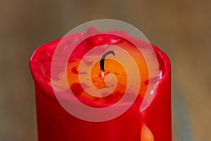 Extinguished red candle