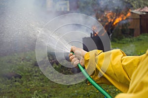 Extinguishing fire in a backyard