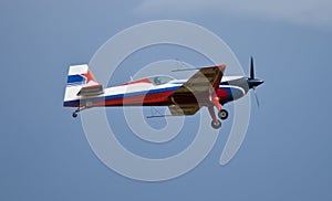 Extra 330 aerobatic airplane flying