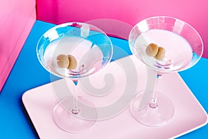 extra dry martinis, classic cocktails with olives, vodka and gin served cold. New modern cockails drinks design concept