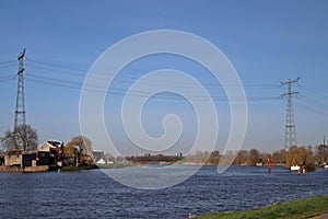 Extra high powerlines over river Hollandse IJssel